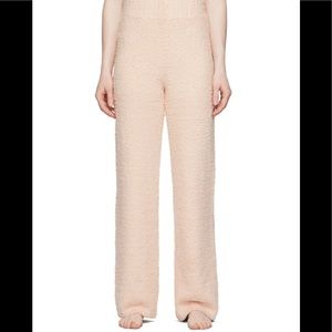 SKIMS PANTS 
Straight-leg knit nylon-blend bouclé lounge pants in pink.